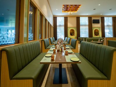 In-house restaurant at Emerald Signature, Mysuru