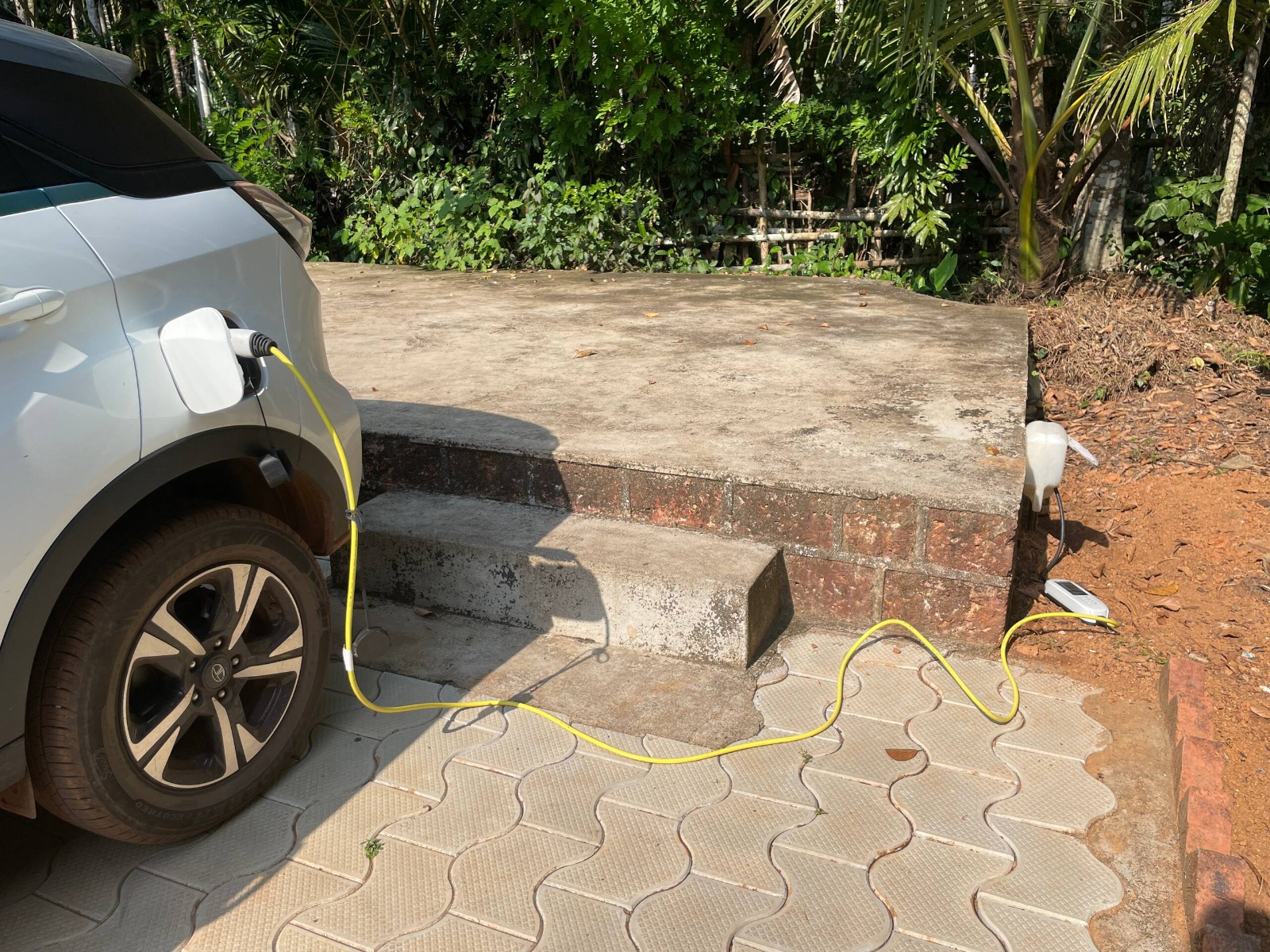 Guest EV charging using an outdoor wall socket at Areca County Honnavar